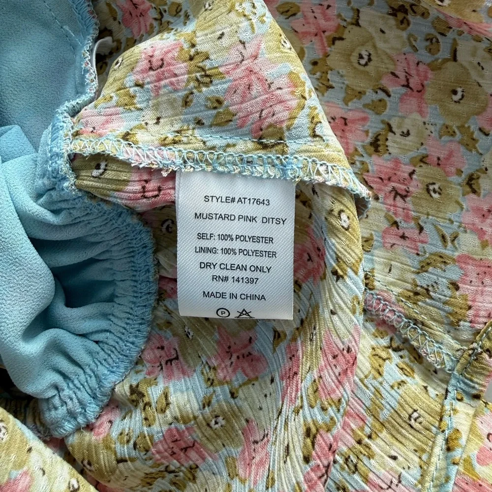 Anthropologie Cream Floral Open-Back Peplum Blouse